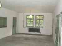 Empty room where prisoners were told to disrobe in preparation for showering